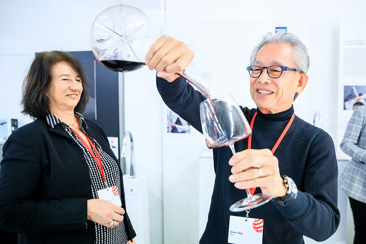 Luisa Bocchietto and Simon Ong testing wine glasses